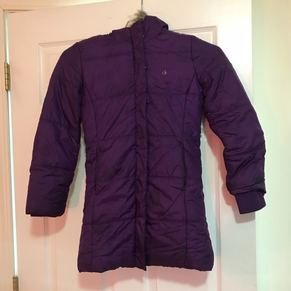 A warm purple Calvin Klein kids winter jacket.